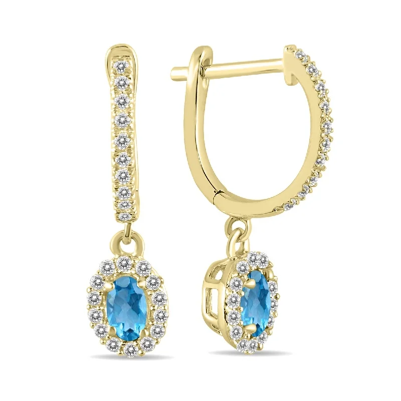 wanderlust chandelier earrings-Marquee 1/2 Carat Oval Blue Topaz and Diamond Halo Dangle Earrings in 10K Yellow Gold