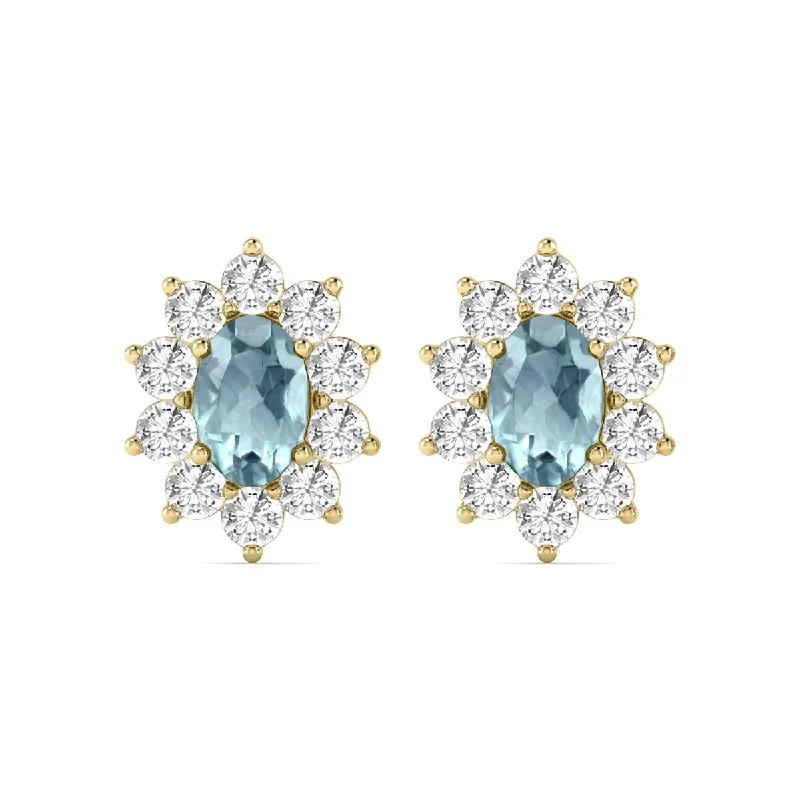 heavy gemstone earrings-Marquee Oval Shape Aquamarine and Diamond Flower Earrings in 14K Yellow Gold