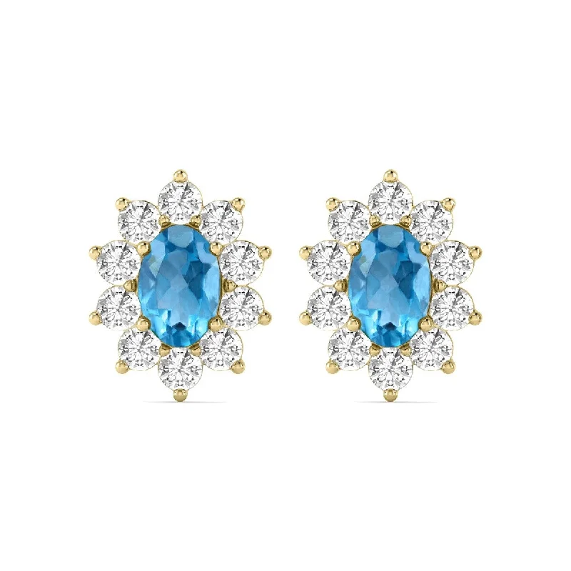 frond sapphire earrings-Marquee Oval Shape Blue Topaz and Diamond Flower Earrings in 14K Yellow Gold